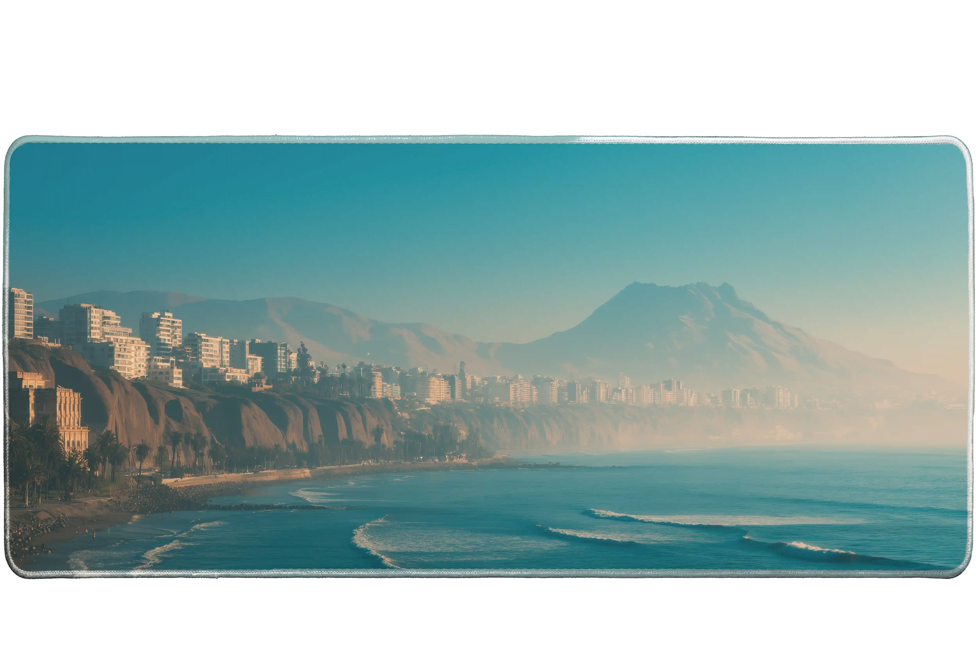 Landscape 36x16in custom desk mat featuring misty coastal city and mountains, non-slip base – PrintMyPad