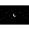 Minimal black desk mat with a pale crescent moon, small white stars, subtle gray bats and gothic corner scrollwork