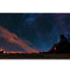 Wide view of the Dark Fantasy Knight desk mat featuring a lone knight and warm campfire beneath a sweeping star field