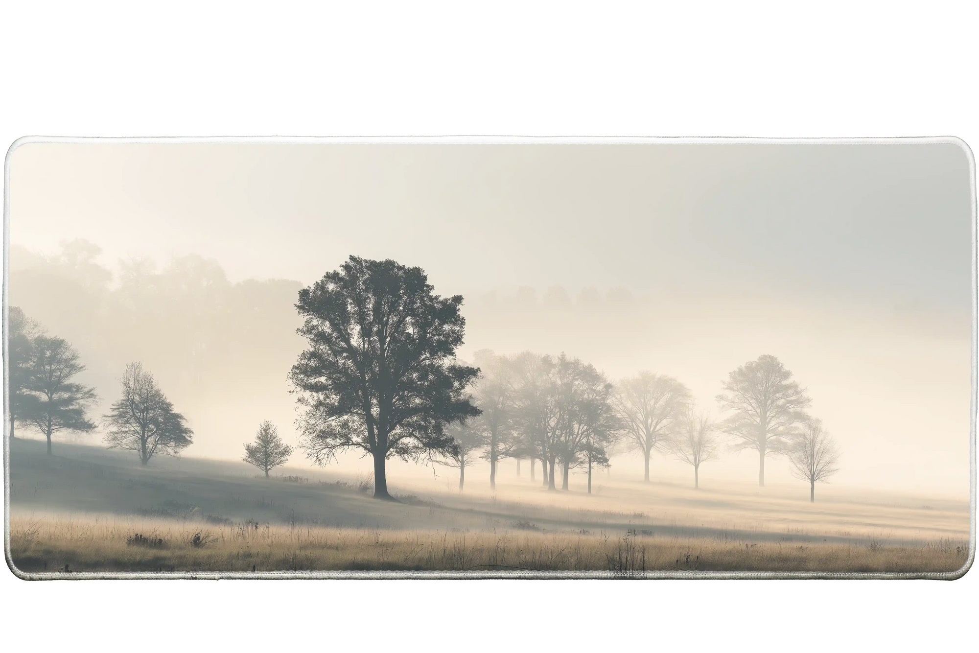 Landscape 90x40cm custom desk mat featuring misty trees in soft morning light, stitched edge – Print My Pad