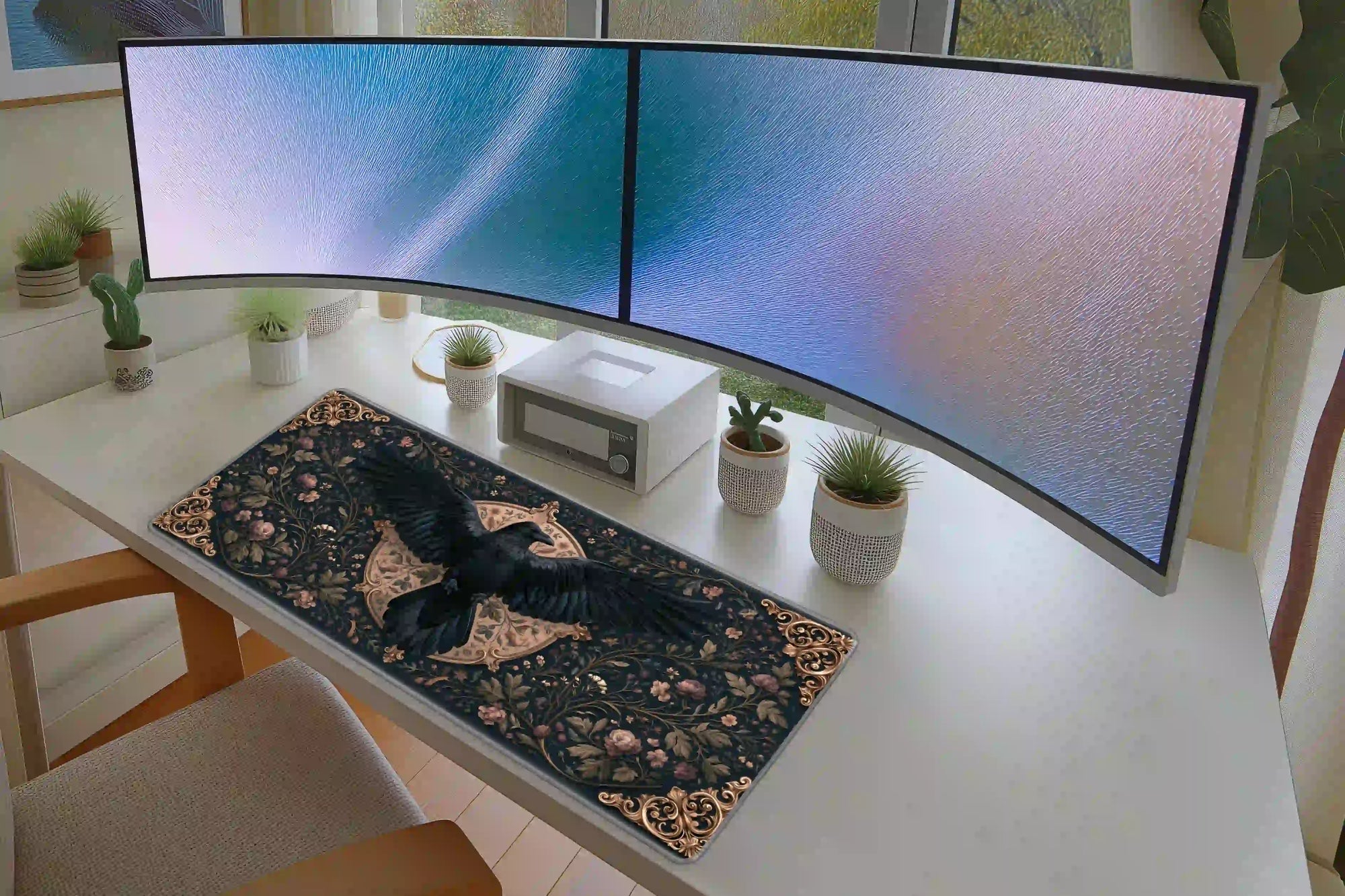 Gothic Raven Floral desk mat in a full desk setup with a keyboard and mouse layout