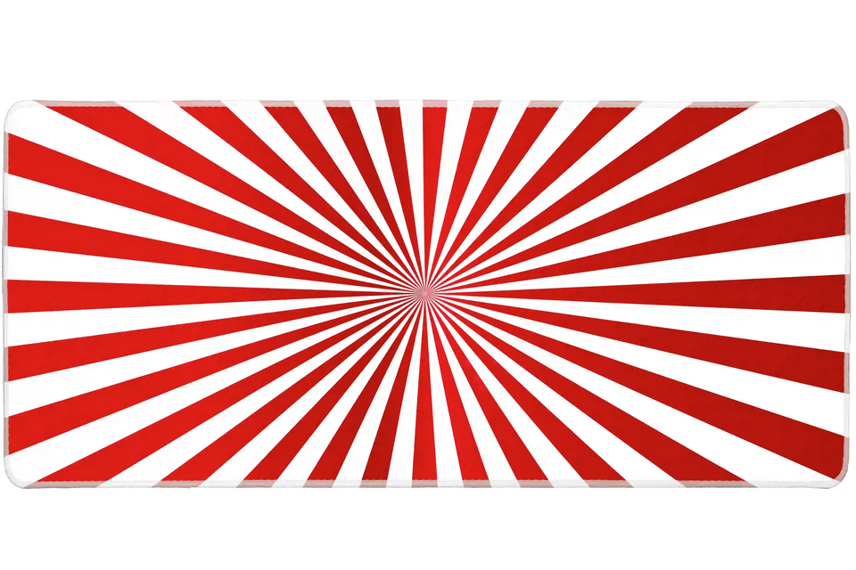 Wide Circus Sunburst desk mat with bold red-and-white big-top sunburst rays