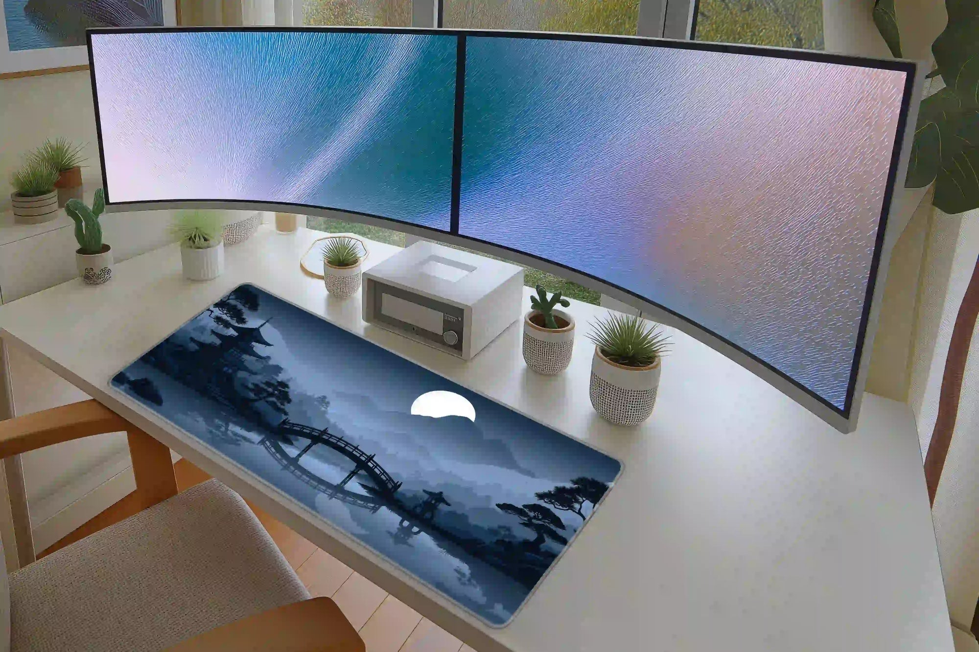 Full keyboard and mouse workspace using the Moonlit Japanese Pagoda desk mat