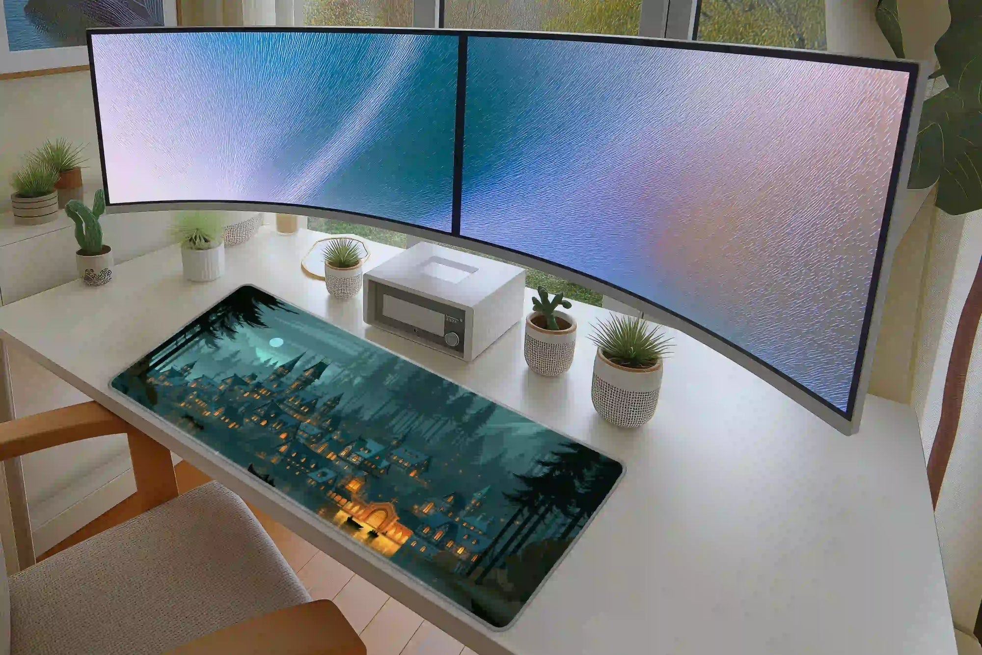 Moonlit Fantasy Village extended mouse pad completing a home office desk setup