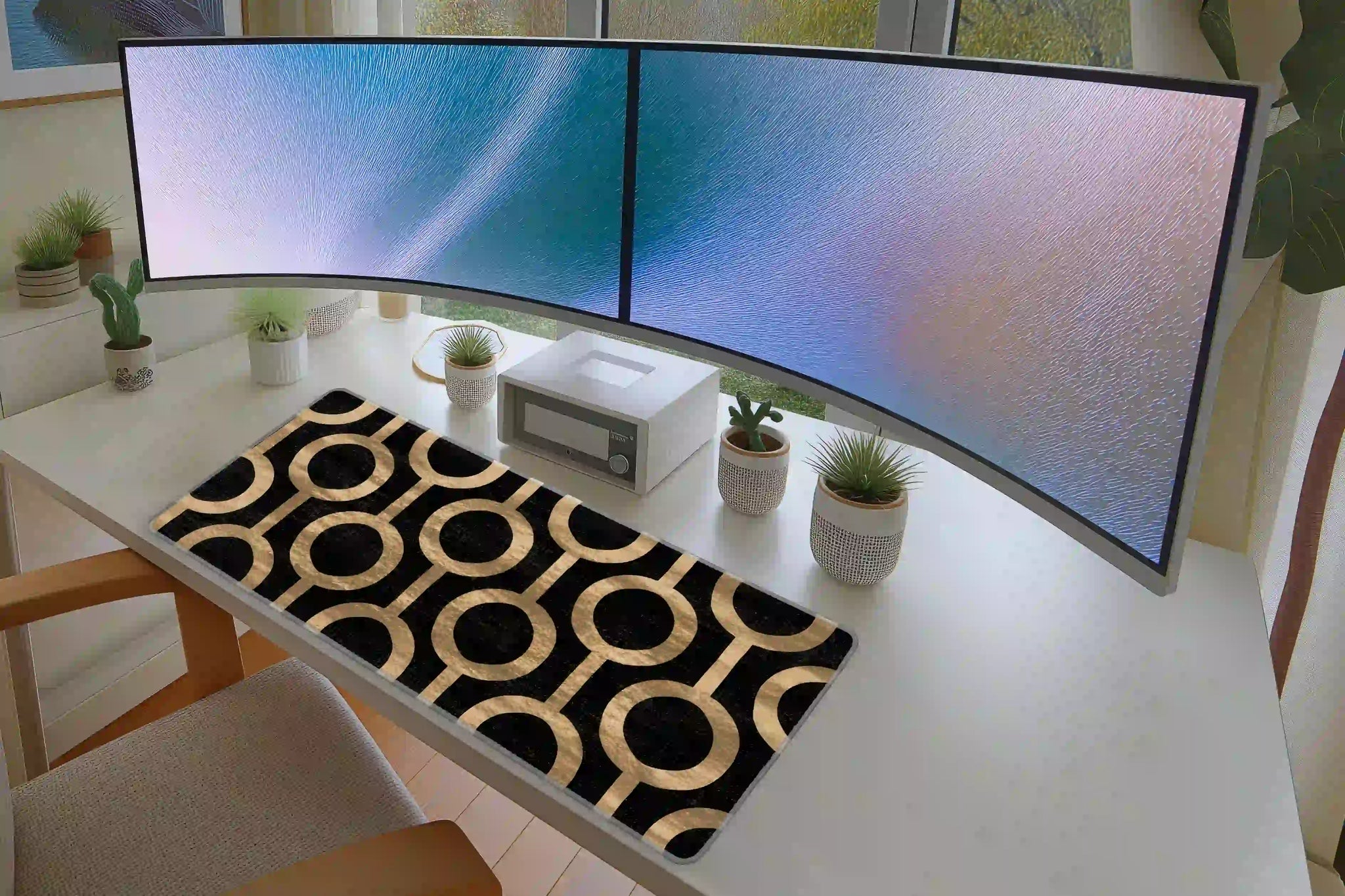 Black and Gold Circle desk mat in a full desk setup with a keyboard and mouse layout