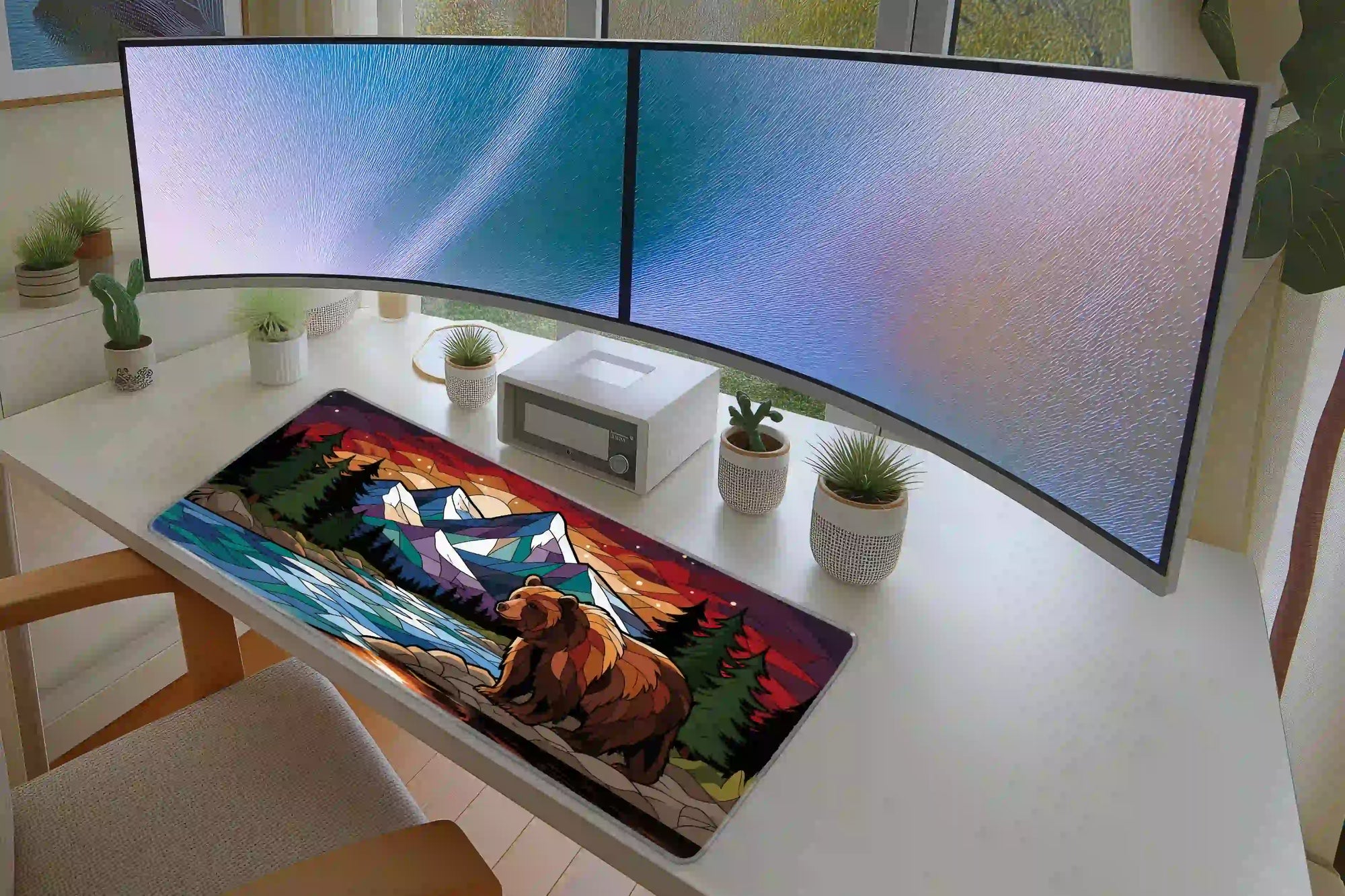Stained glass bear mountain landscape mouse pad in a full student or gaming desk setup