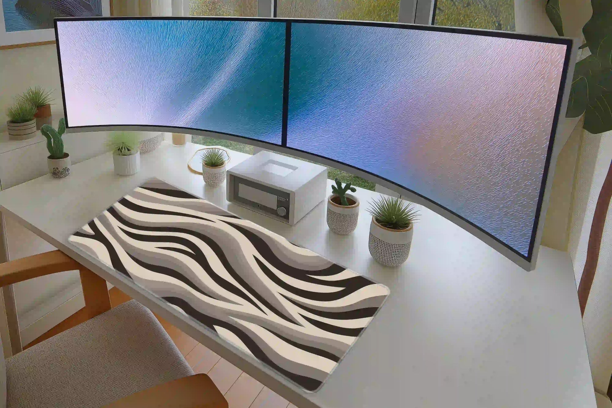 Neutral Zebra Print desk mat in a full desk setup with a keyboard and mouse layout