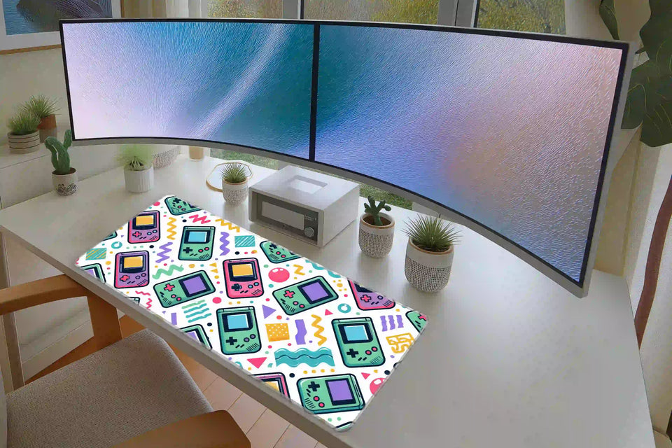 Pastel Handheld Gaming desk mat in a full desk setup with a keyboard and mouse layout