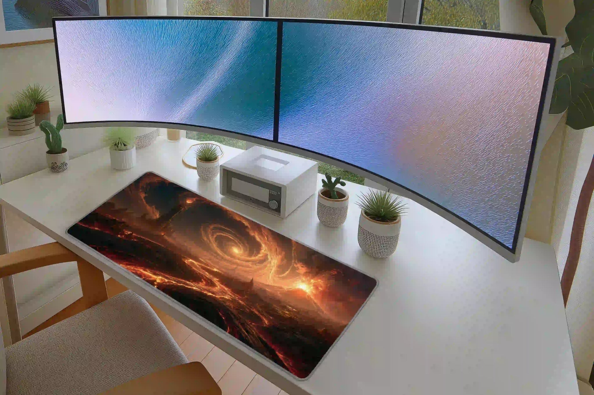 Volcanic Fantasy Tower desk mat arranged under a keyboard and mouse on a student study desk
