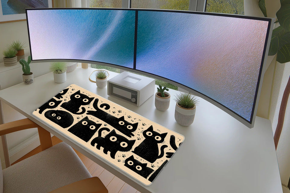 Kawaii Black Cat Desk Mat | Cute Pattern Mouse Pad in a full desk setup with keyboard, mouse, and office accessories