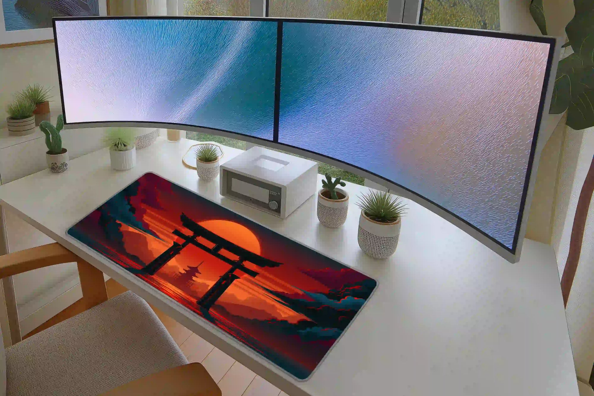 Keyboard and mouse layout on the Torii Gate Sunset desk mat for a gaming setup