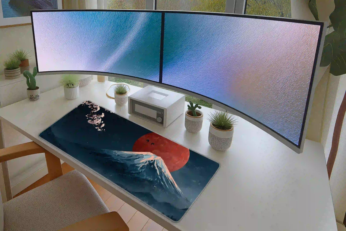 Japanese mountain and cherry blossom desk mat in a full white desk setup beneath two monitors