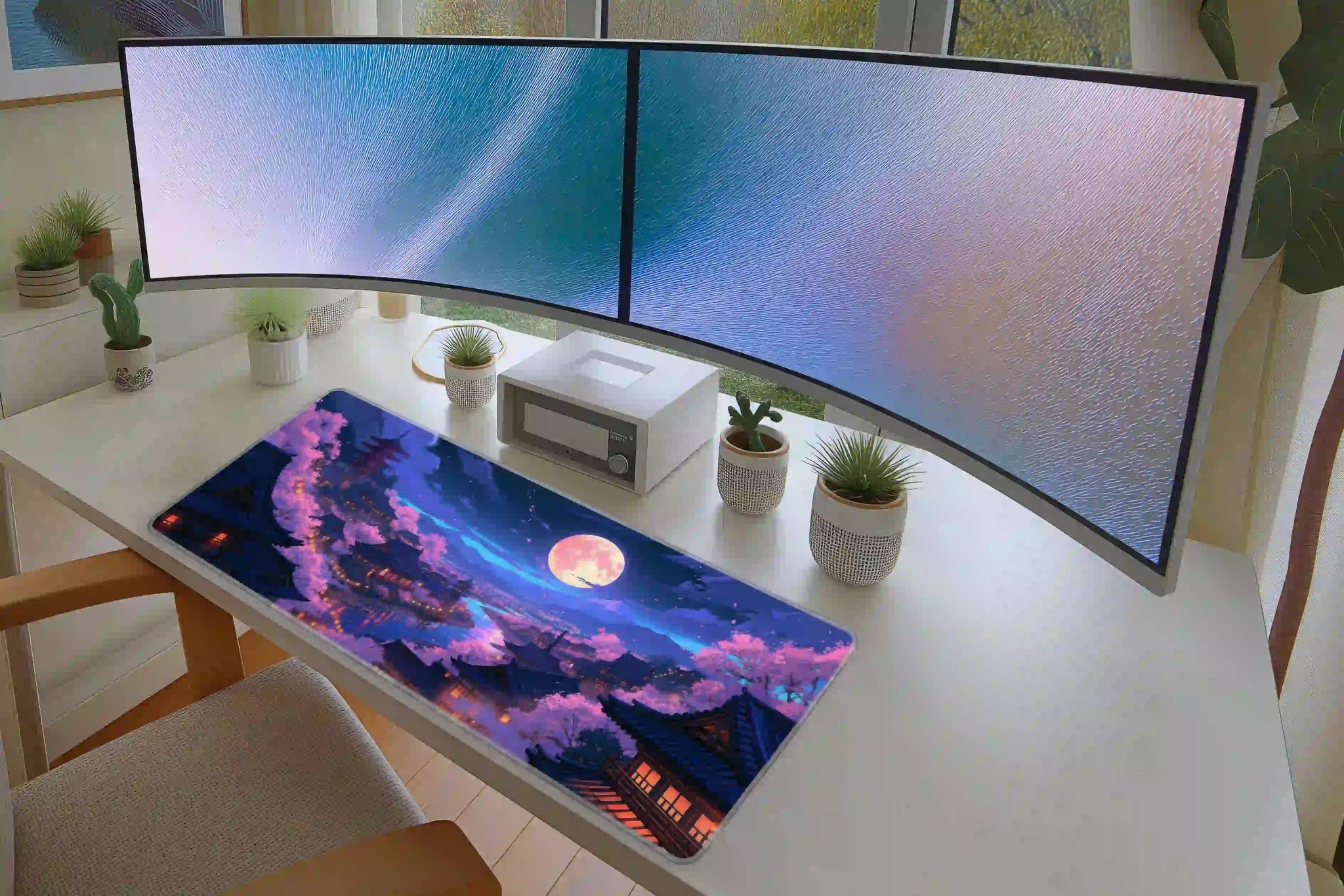 Cherry Blossom Night desk mat arranged under a keyboard and mouse on a student study desk