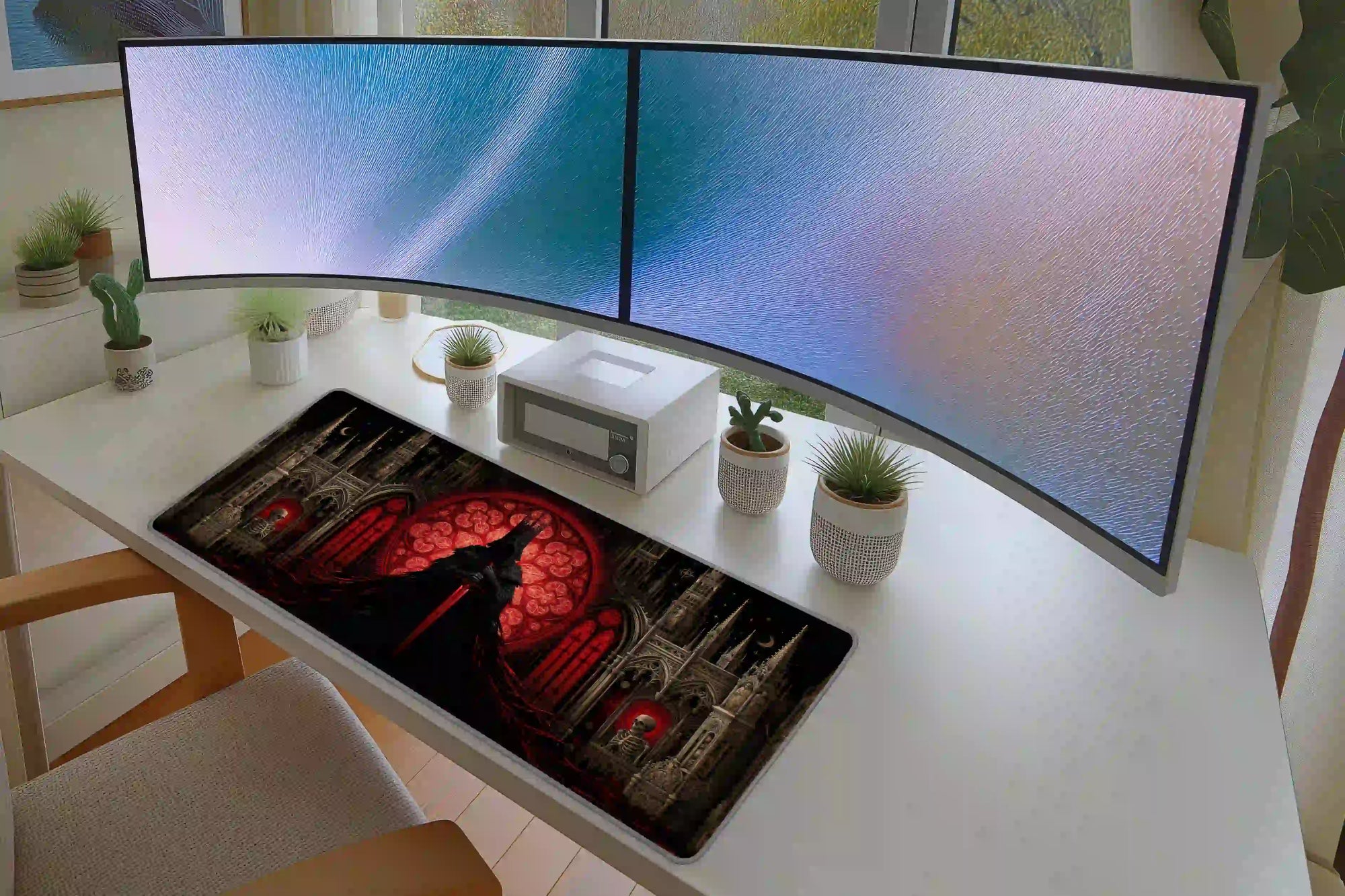 Keyboard and mouse layout on the Gothic Knight Cathedral desk mat for a gaming setup