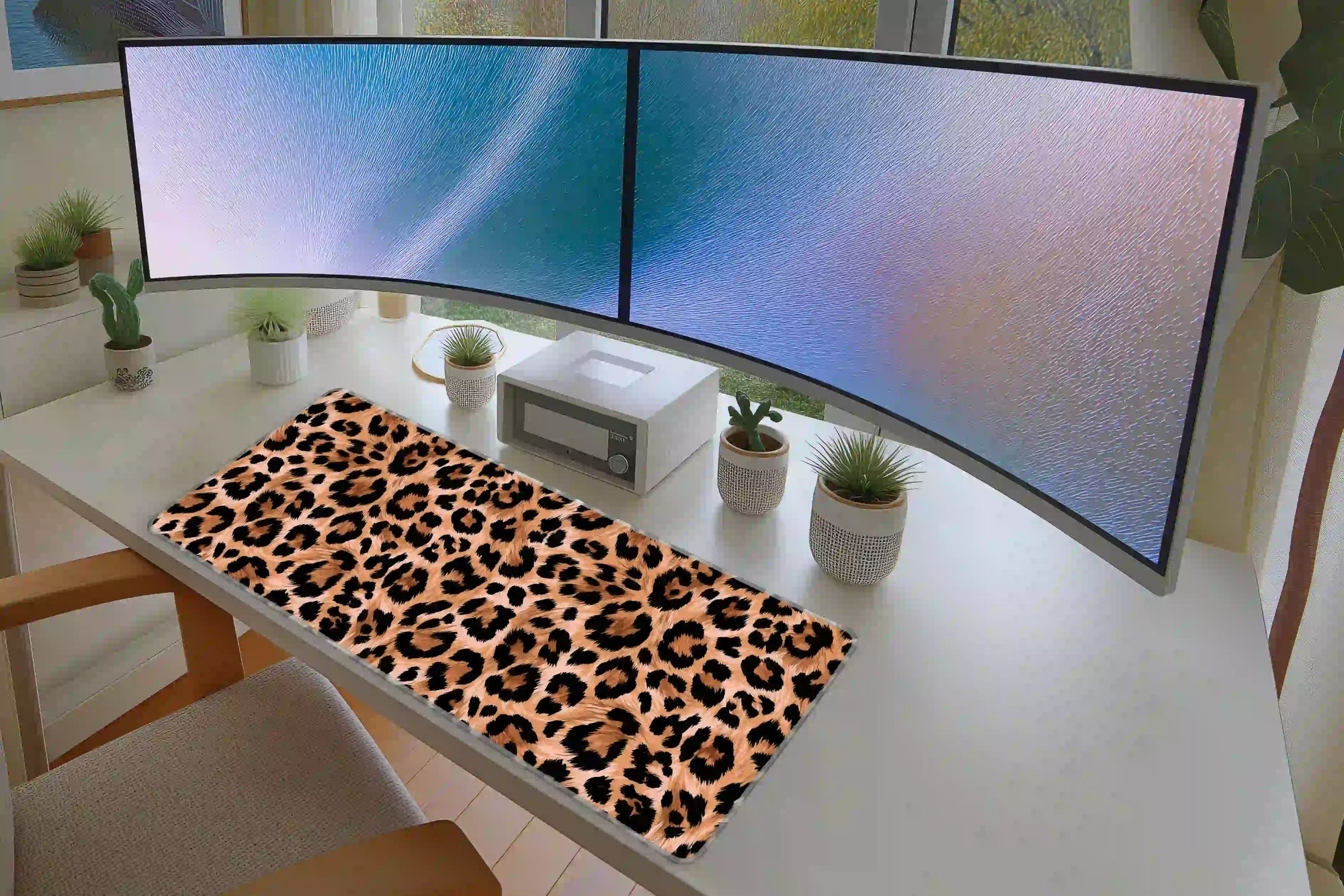Leopard Print desk mat in a full desk setup with a keyboard and mouse layout