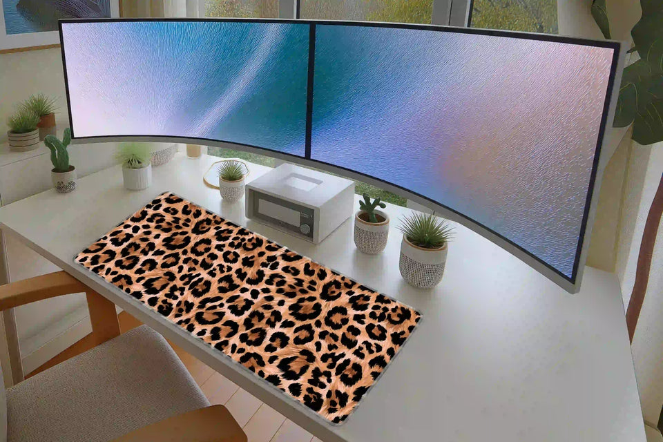 Leopard Print desk mat in a full desk setup with a keyboard and mouse layout