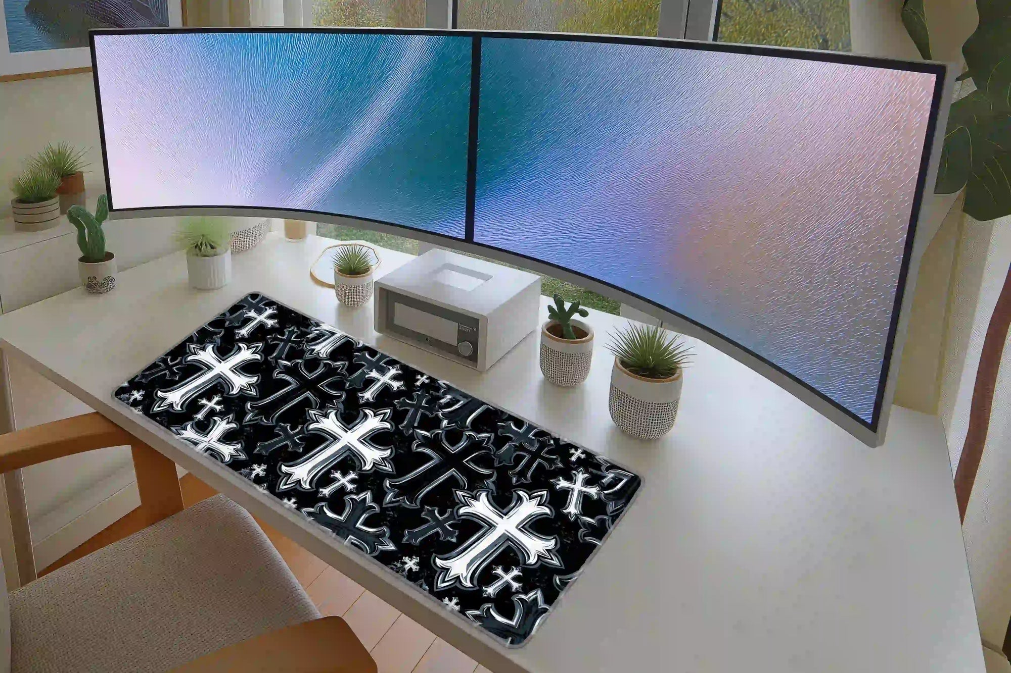 Black and white gothic cross pattern mouse pad in a full student or gaming desk setup