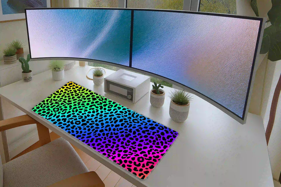 Rainbow Leopard desk mat arranged under a keyboard and mouse on a student study desk