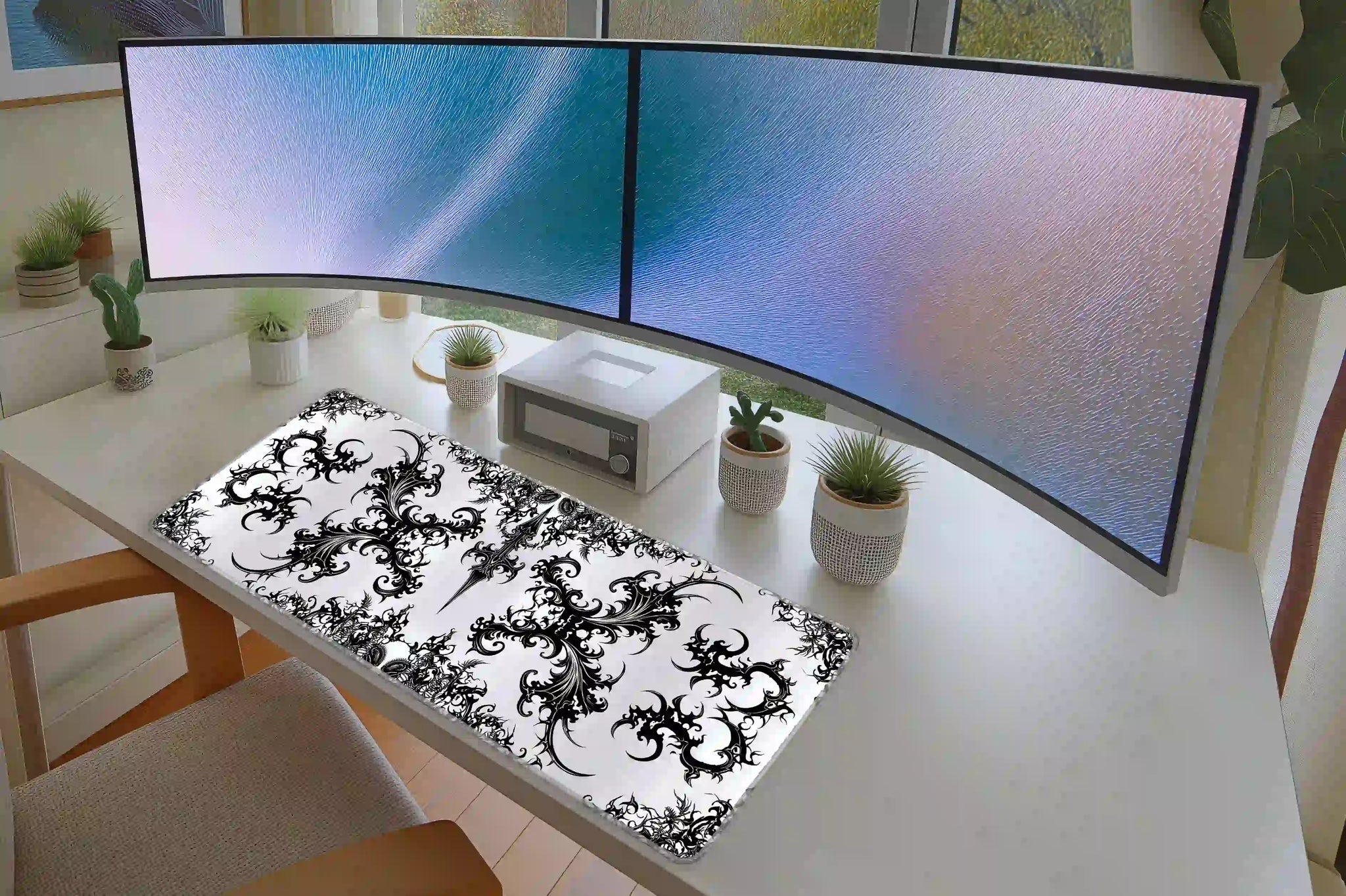 Office desk setup featuring the black and white gothic tribal pattern extended mouse pad