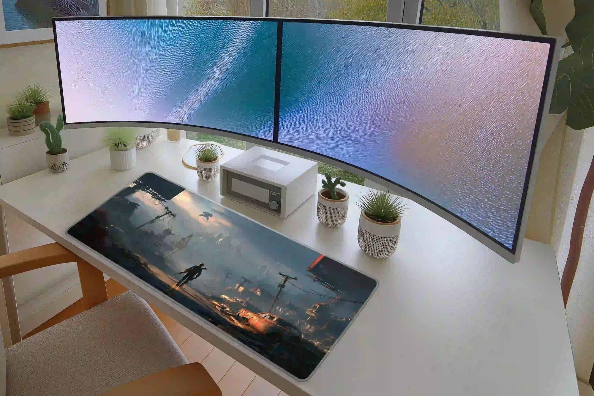 Office desk setup featuring the post-apocalyptic wasteland survivor extended mouse pad