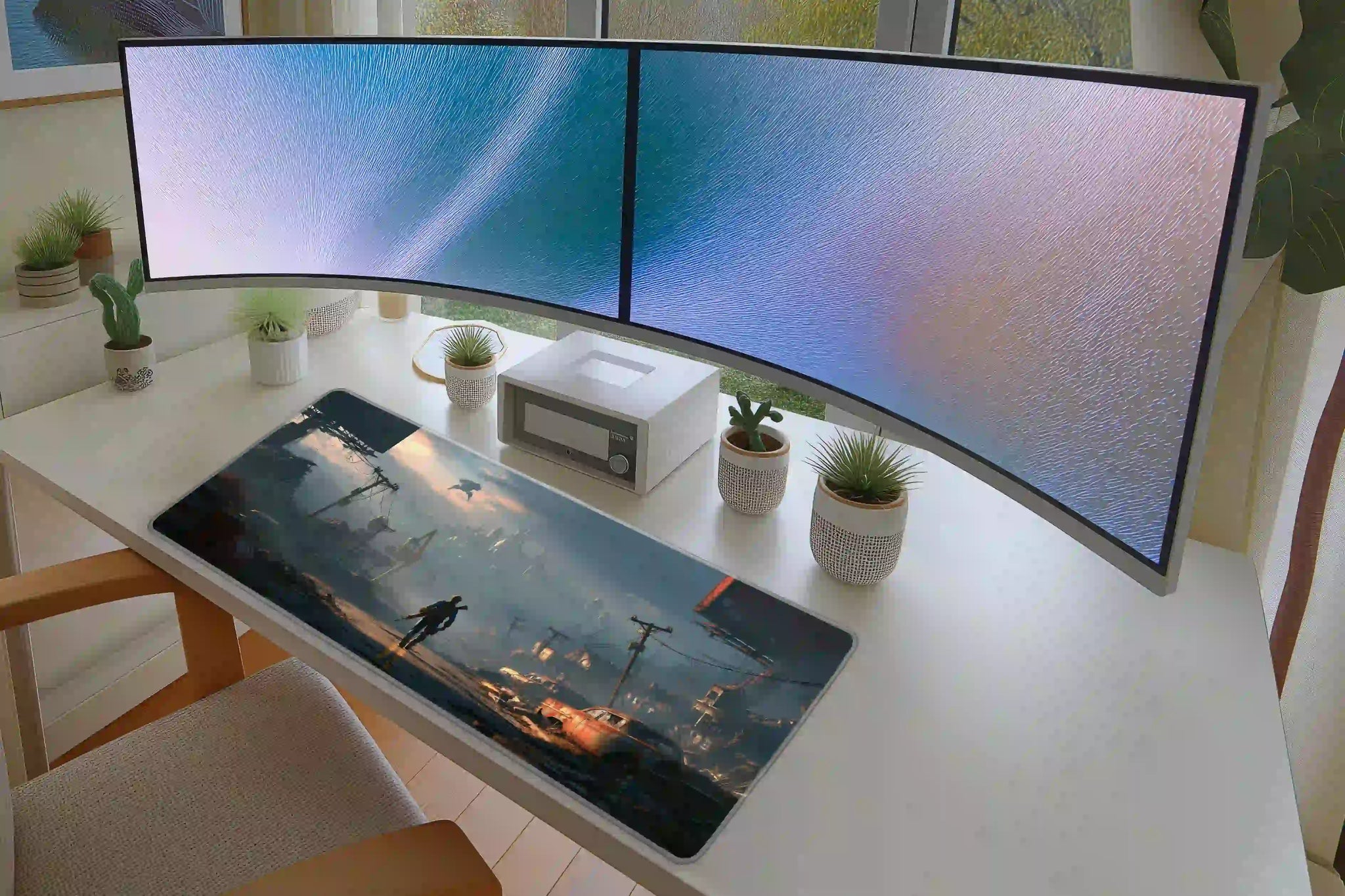 Office desk setup featuring the post-apocalyptic wasteland survivor extended mouse pad