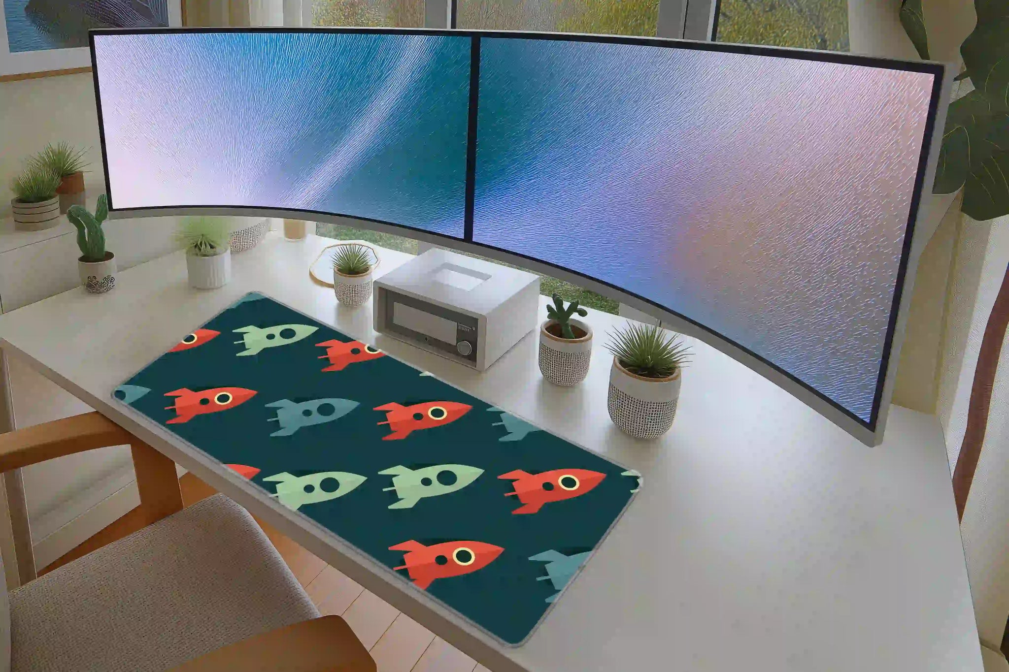 Retro Rocket Pattern desk mat arranged under a keyboard and mouse on a student study desk