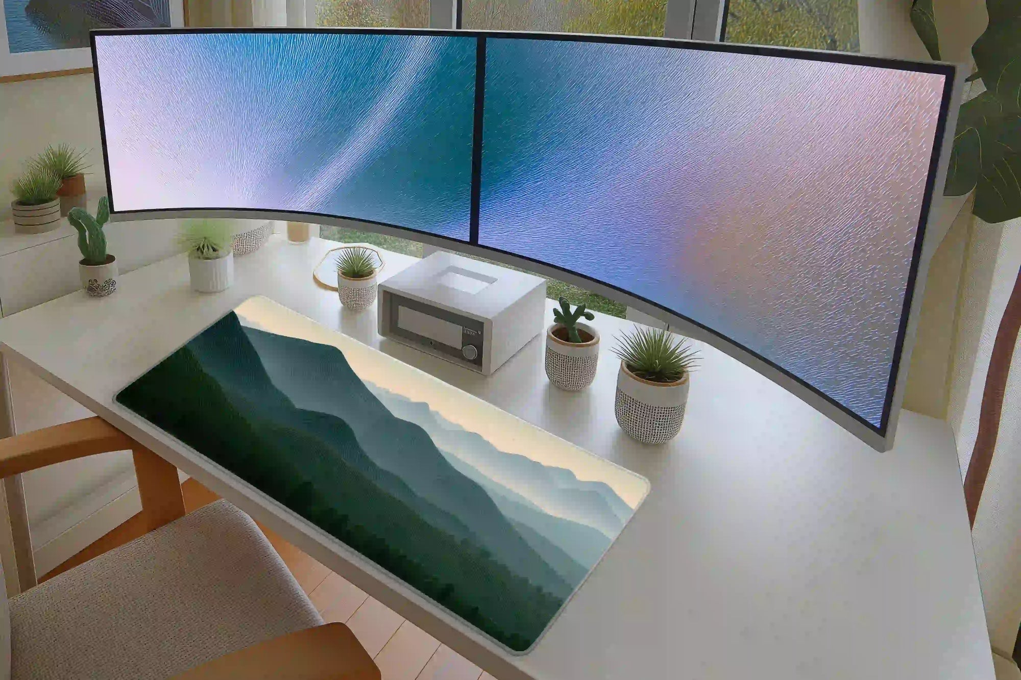 Layered Mountain desk mat in a full desk setup with a keyboard and mouse layout