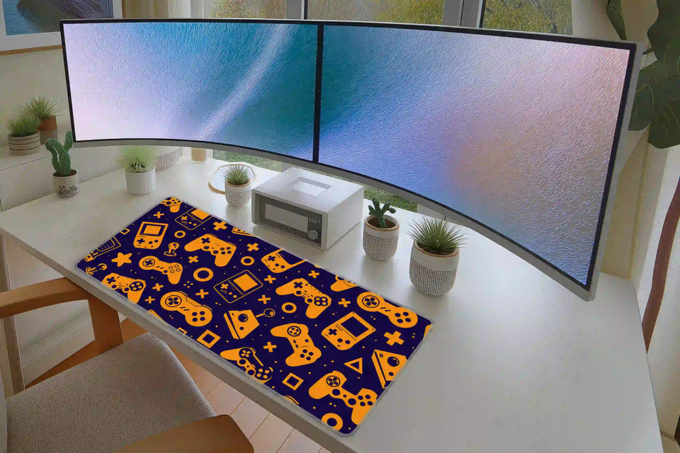 Retro Game Controller desk mat in a full desk setup with a keyboard and mouse layout