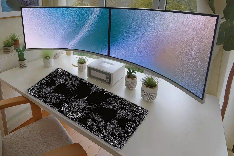 Gothic thorn sigil black and silver mouse pad in a full student or gaming desk setup