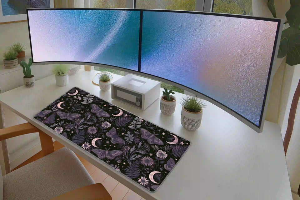 Celestial Moth desk mat in a full desk setup with a keyboard and mouse layout