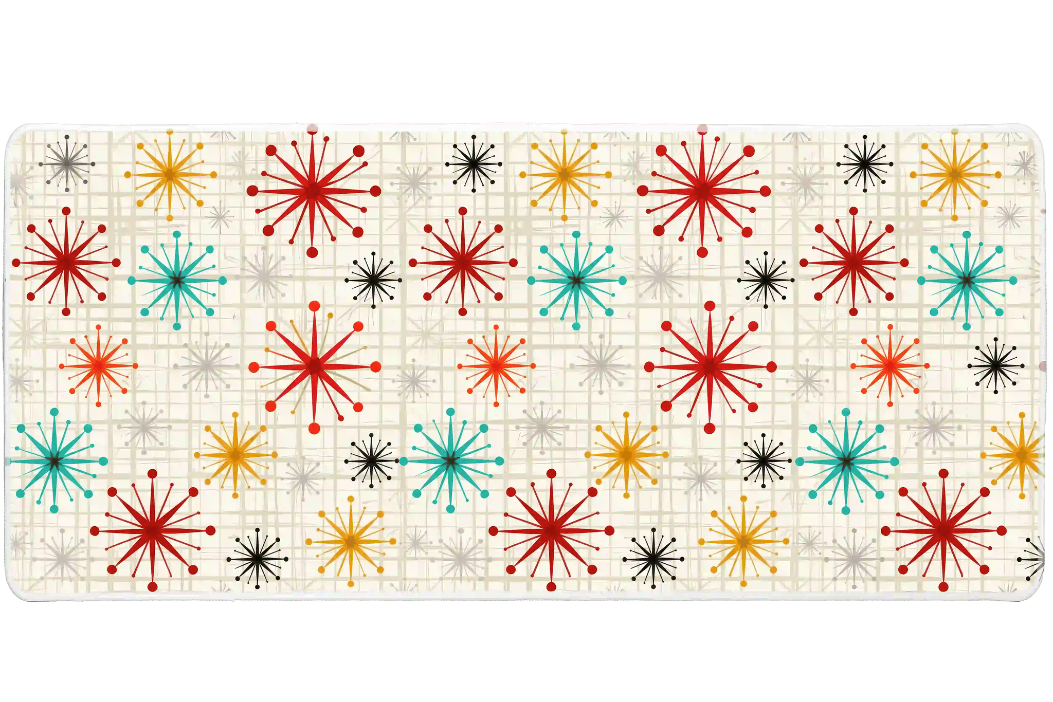 Wide view of the Mid Century Atomic Starburst desk mat featuring atomic starbursts and a geometric grid