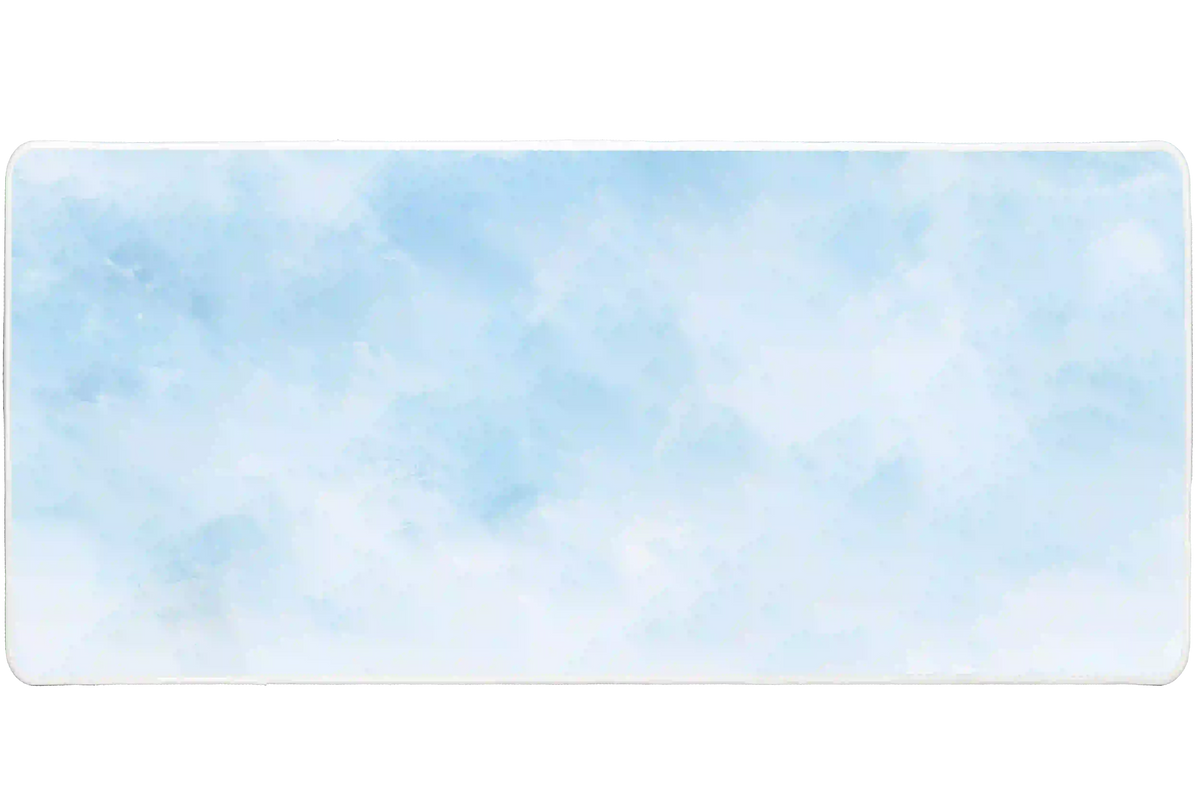 Minimalist watercolor cloud desk mat with pale blue washes blending into soft white areas