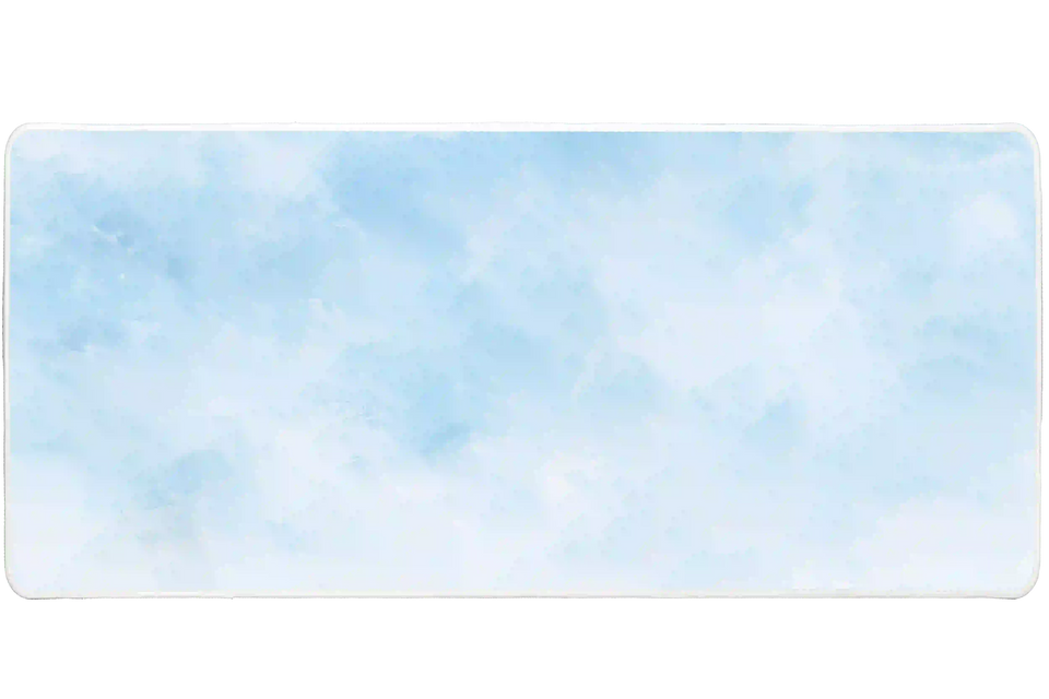 Minimalist watercolor cloud desk mat with pale blue washes blending into soft white areas