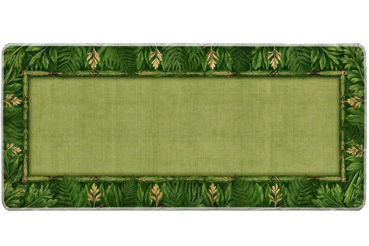 Green botanical desk mat with fern and leaf borders, warm golden accents and an open sage center