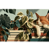Cat on Books Desk Mat | Plant Lover Mouse Pad artwork on an extended desk mat with orange cat on books among houseplants