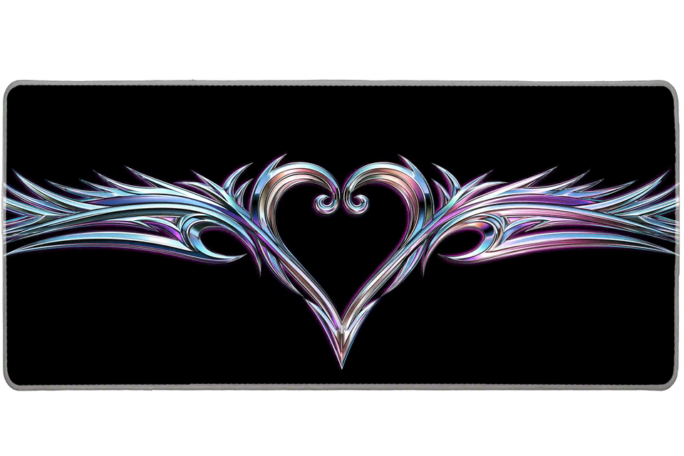 Chrome tribal heart Y2K artwork on an extended desk mat for a full keyboard and mouse layout