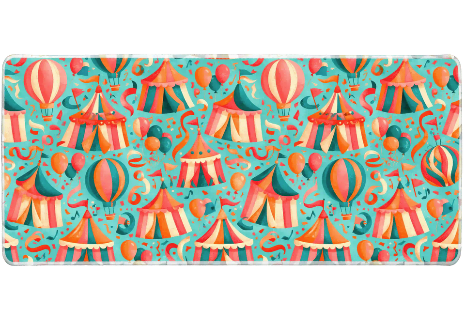Wide Vintage Circus desk mat with big-top tents, hot-air balloons, streamers and confetti