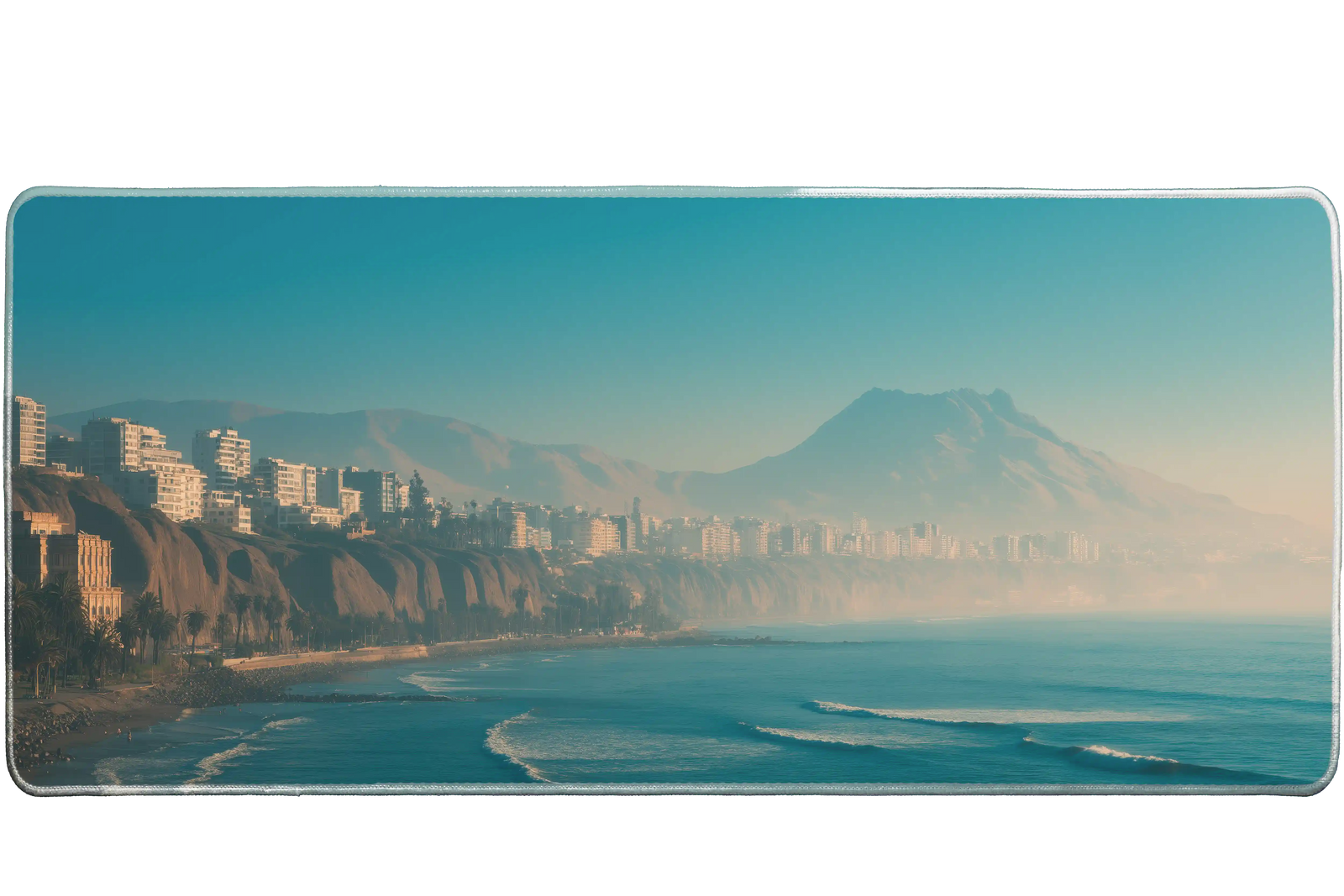 Landscape 36x16in custom desk mat featuring misty coastal city and mountains, non-slip base – PrintMyPad
