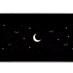 Minimal black desk mat with a pale crescent moon, small white stars, subtle gray bats and gothic corner scrollwork
