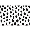 Overhead Dalmatian Spots desk mat view with irregular black animal spots on a crisp white field
