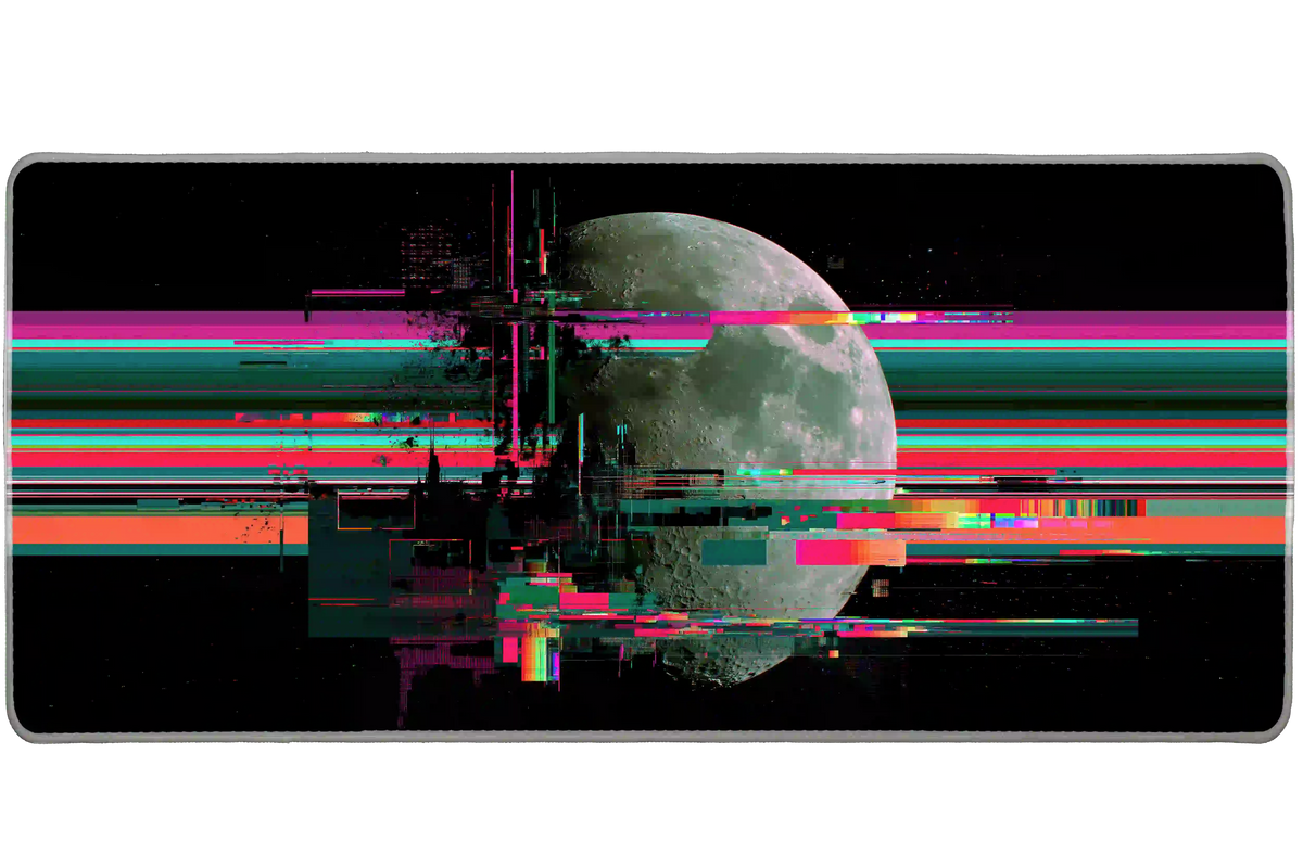 Glitch moon desk mat with a gray lunar surface crossed by pink, cyan, green, red and orange digital bands on black