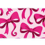Hot Pink Bow Oversized Ribbon desk mat with oversized ribbon artwork on a soft pink background