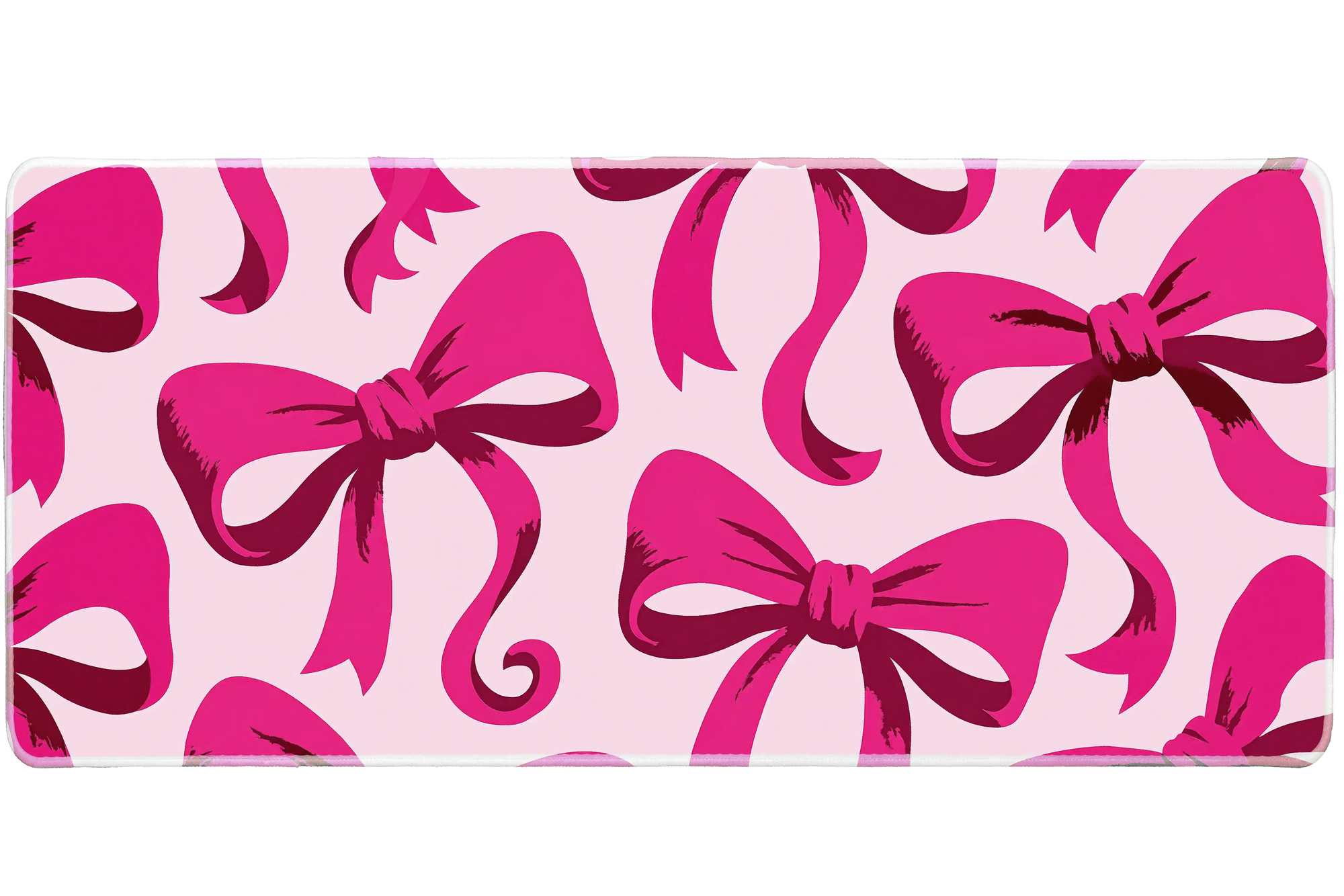 Hot Pink Bow Oversized Ribbon desk mat with oversized ribbon artwork on a soft pink background