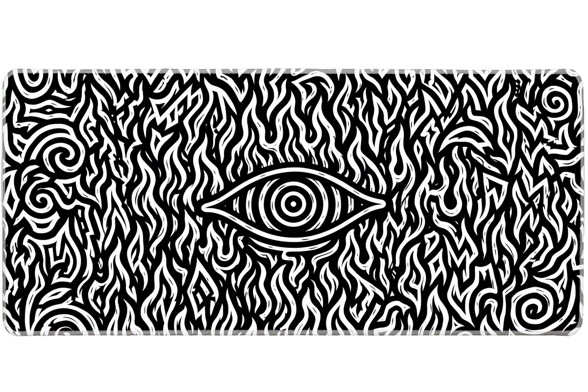Black and white hypnotic eye desk mat with a central eye surrounded by swirling flame shapes and spirals