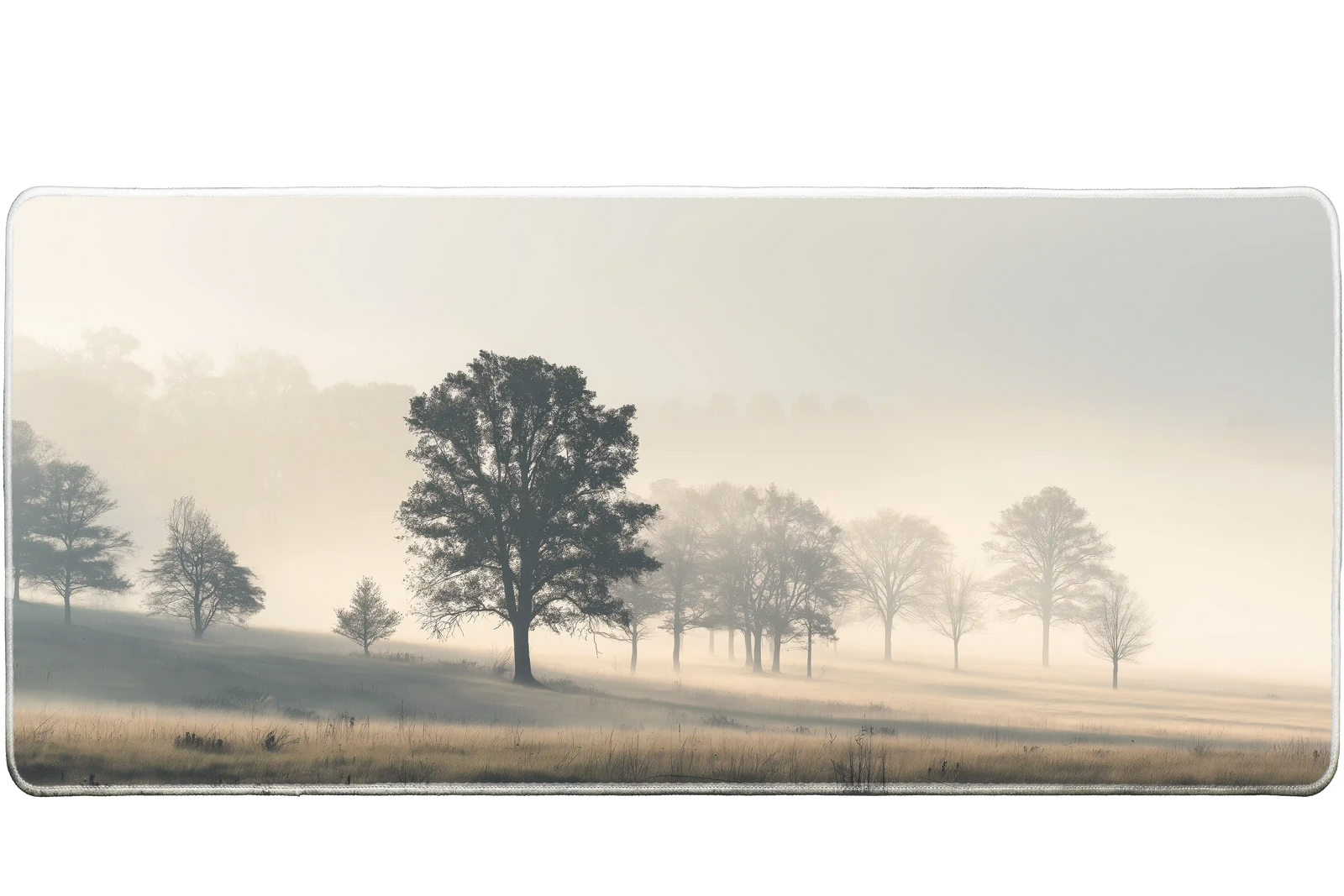 Landscape 90x40cm custom desk mat featuring misty trees in soft morning light, stitched edge – Print My Pad