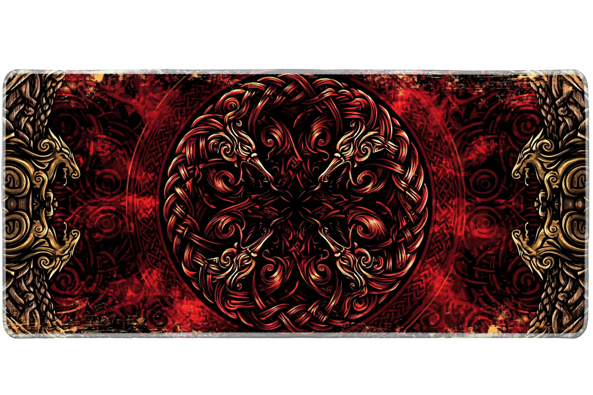 Norse-inspired dragon knot desk mat with a circular red and black emblem and antique gold-colored ornament