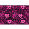 Black and hot pink desk mat patterned with spiderwebs, spiders inside hearts and scattered stars