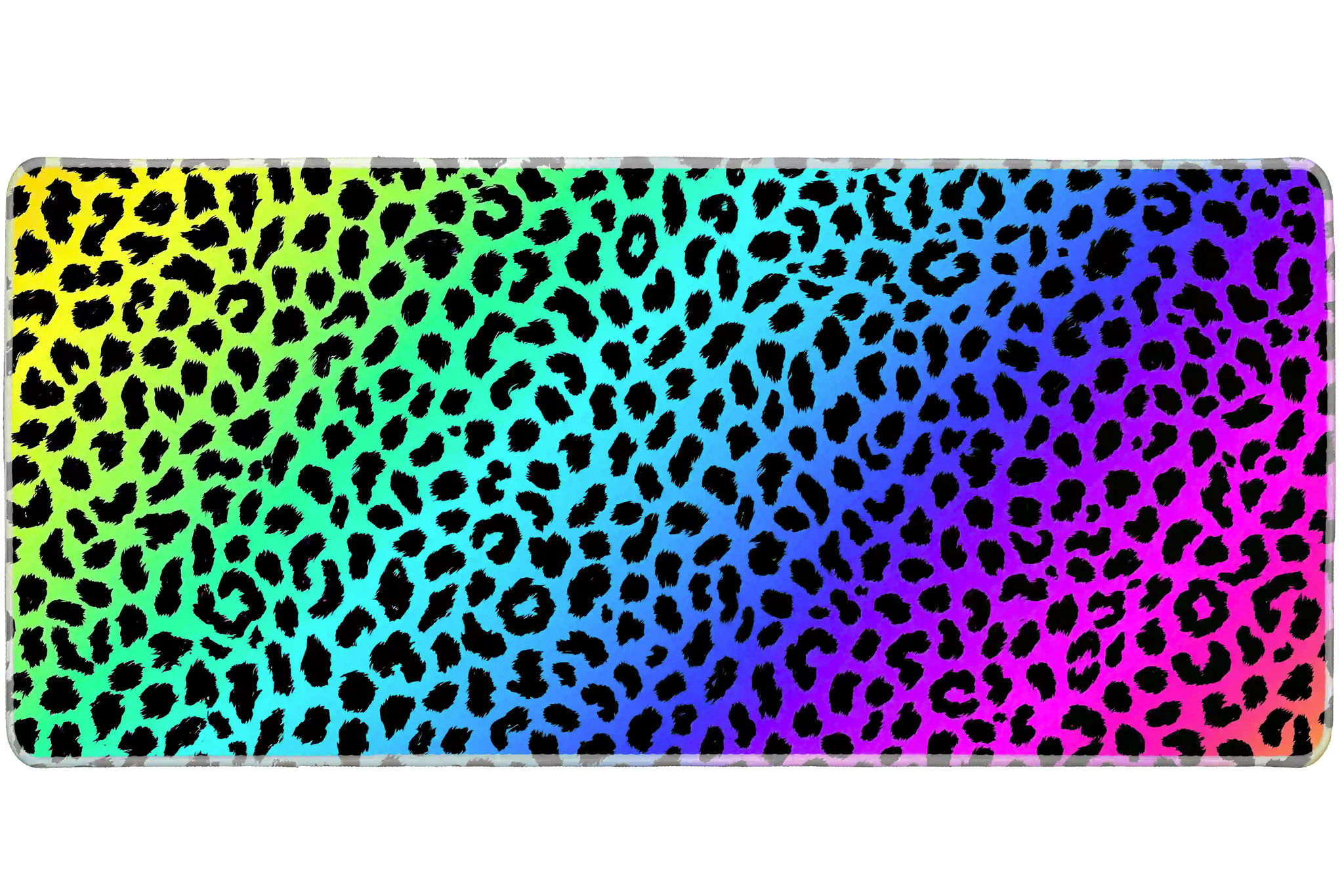 Full-width Rainbow Leopard desk mat showing black leopard spots over a vivid rainbow gradient