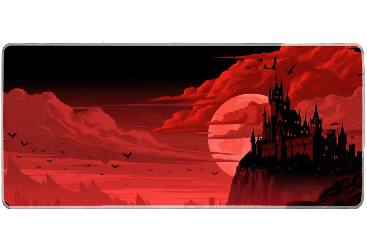 Red moon gothic castle desk mat with a black fortress, flying bats and sweeping crimson clouds