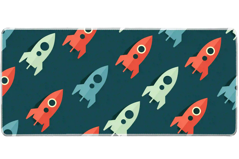 Full-width Retro Rocket Pattern desk mat showing playful vintage rockets on a deep teal background